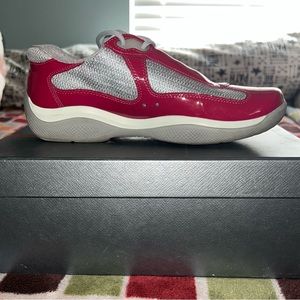 Pink and grey Prada shoes.